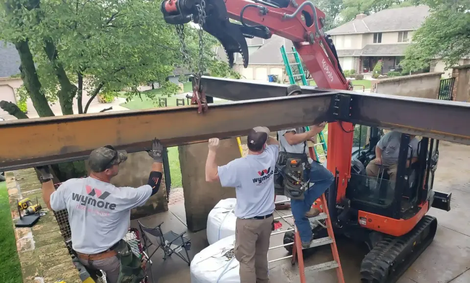 Photo of a Wymore Deck & Crew building a frame for an elevated deck.