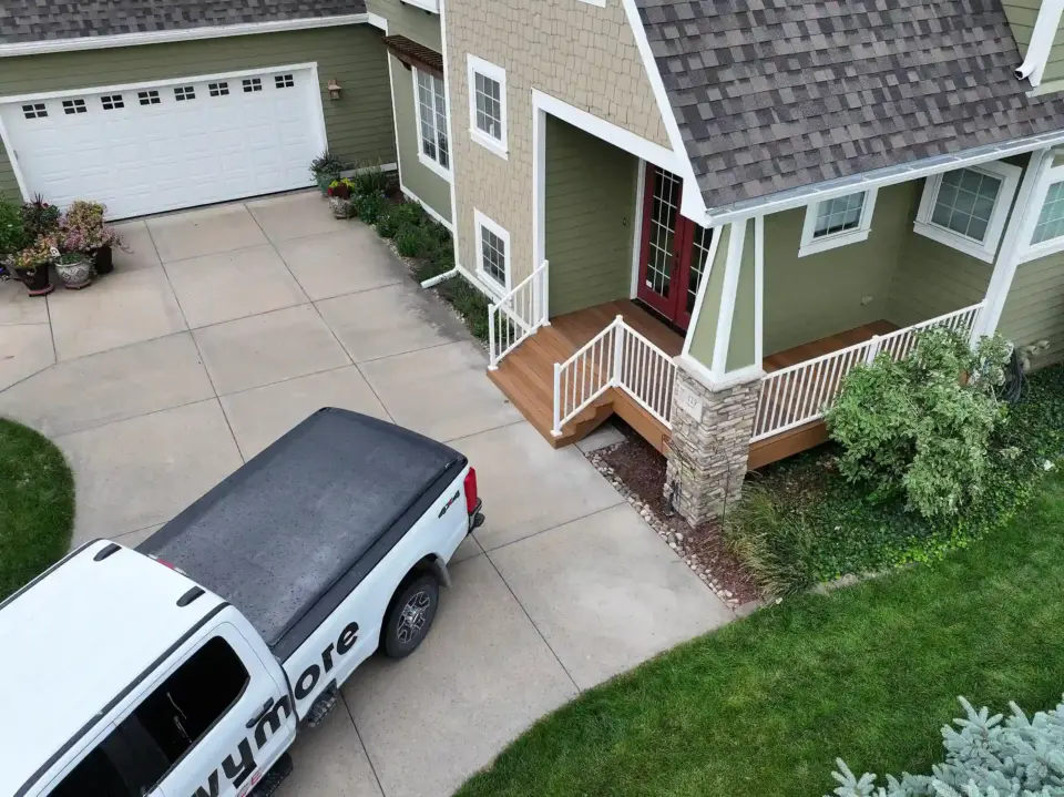 Photo of a completed custom deck with elevated deck and balcony deck above