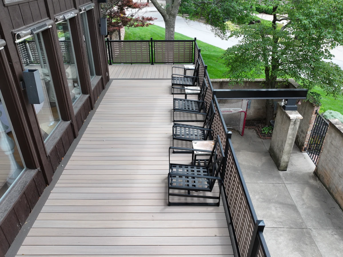 aerial-view-of-the-church-deck-with-chairs-and-black-brown-wooden-railing-in-omaha-ne
