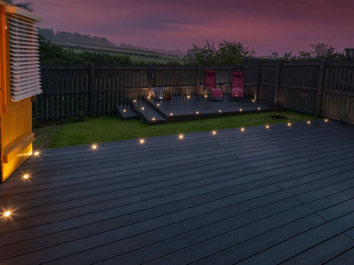 custom-deck-with-lighting-and-couch-with-privacy-wall-fence-in-omaha-ne