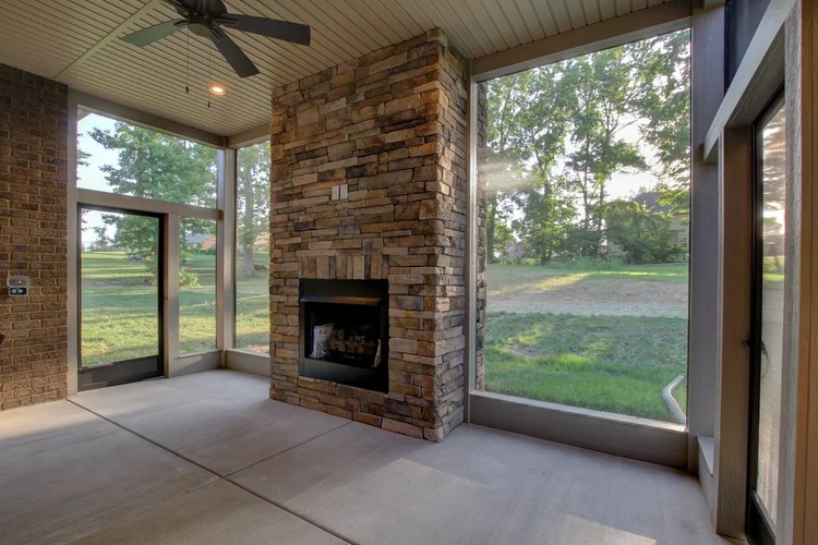 fireplace-installation-on-the-screened-porch-with-fan-on-the-ceiling-in-omaha-ne