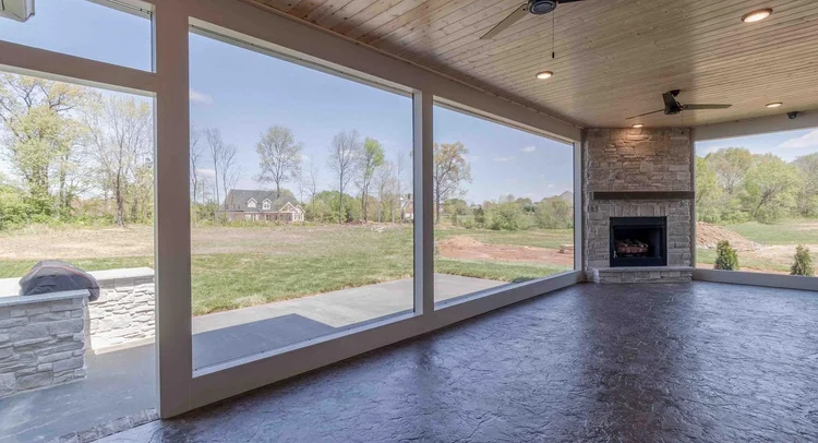 interior-of-the-screened-porch-with-fireplace-installation-in-omaha-ne