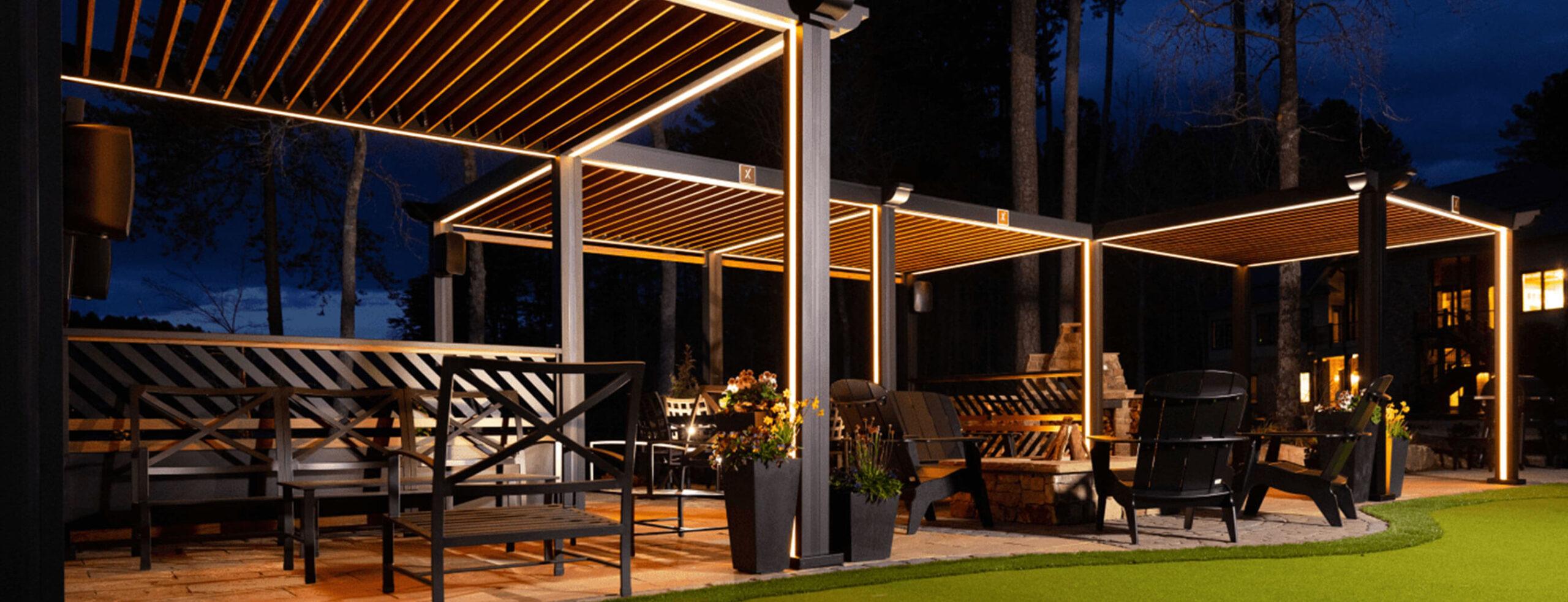 night-scene-of-the-cabana-with-outdoor-living-furniture-and-firepit-in-omaha-ne