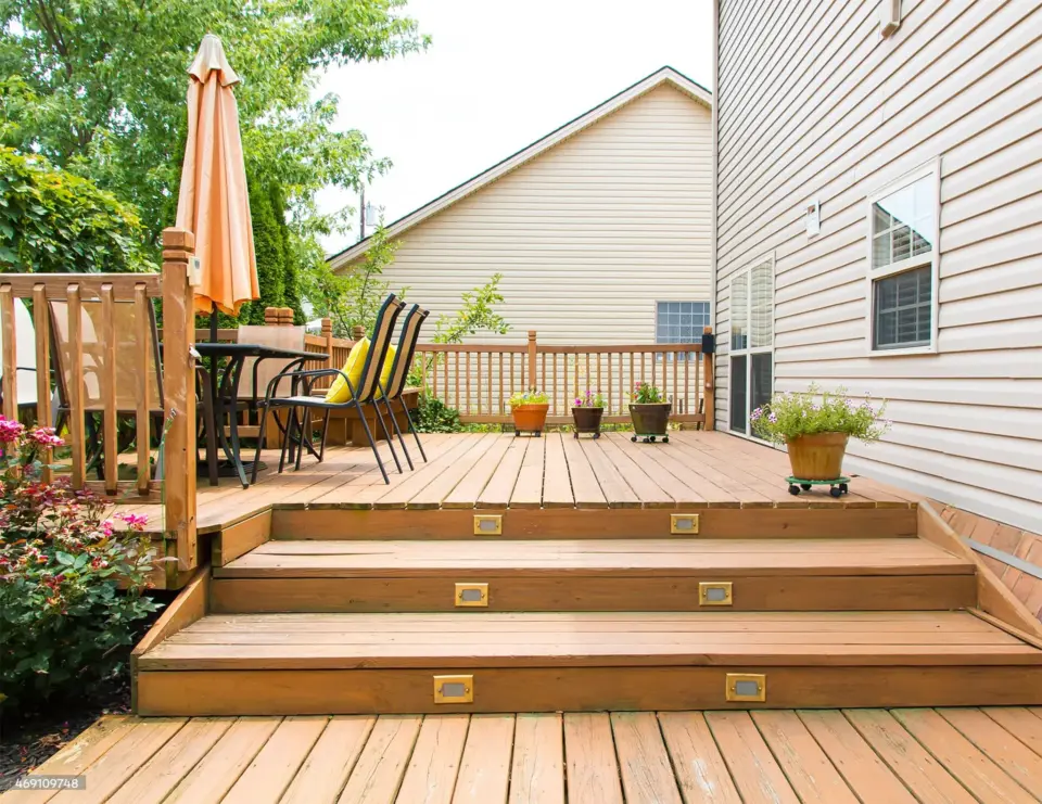 outdoor-front-deck-lighting-on-the-residential-deck-with-outdoor-furniture-in-omaha-ne