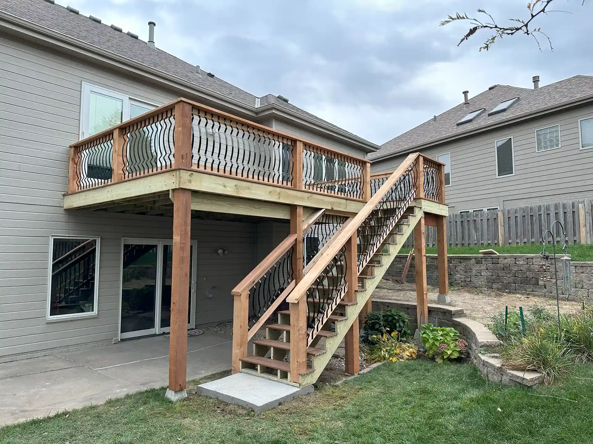 elevated wooden deck - pressure treated wood vs composite decking - Cost comparison
