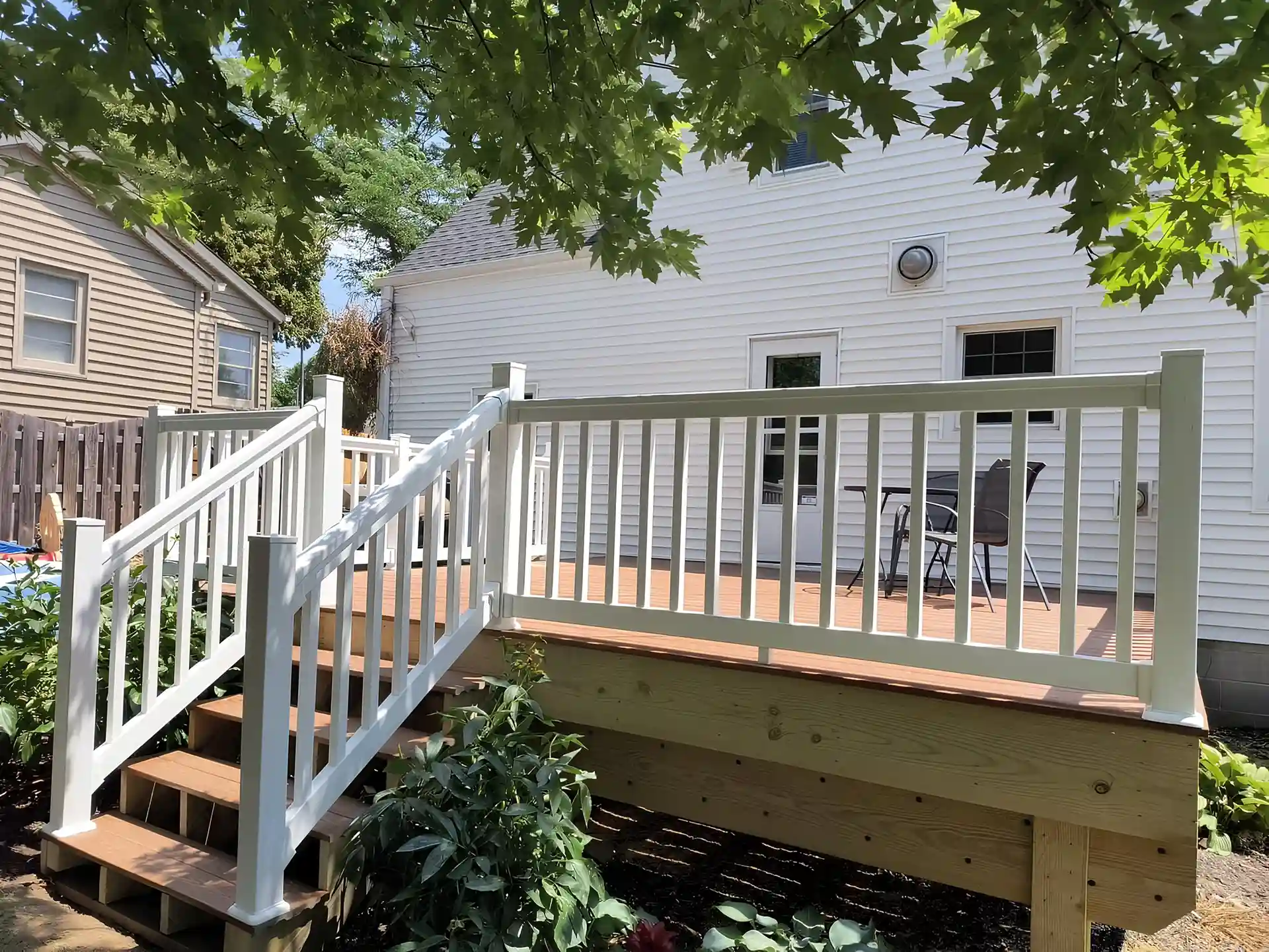 raised-residential-deck-with-chairs-in-omaha-ne