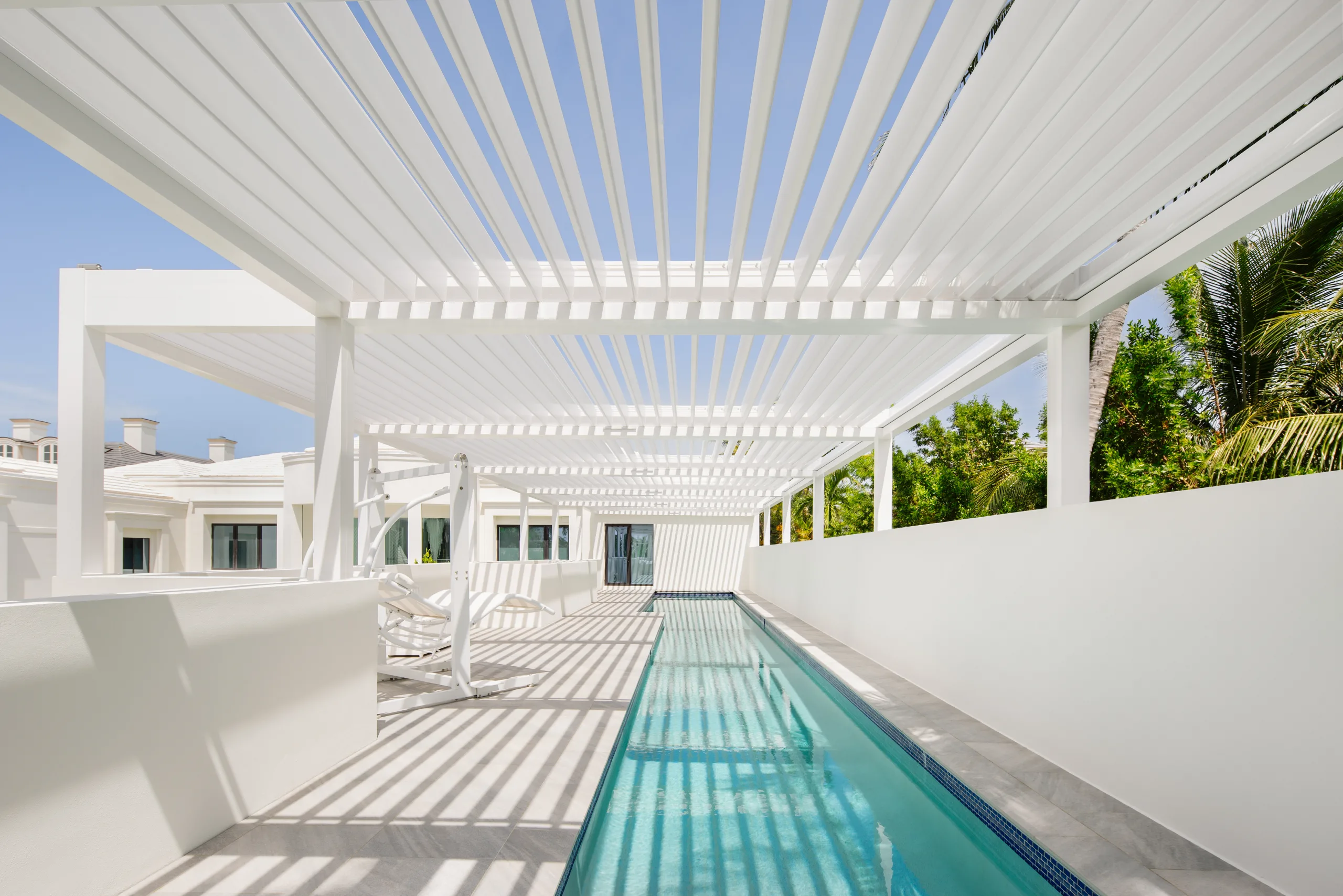 white-long-pergola-on-the-pool-in-omaha-ne